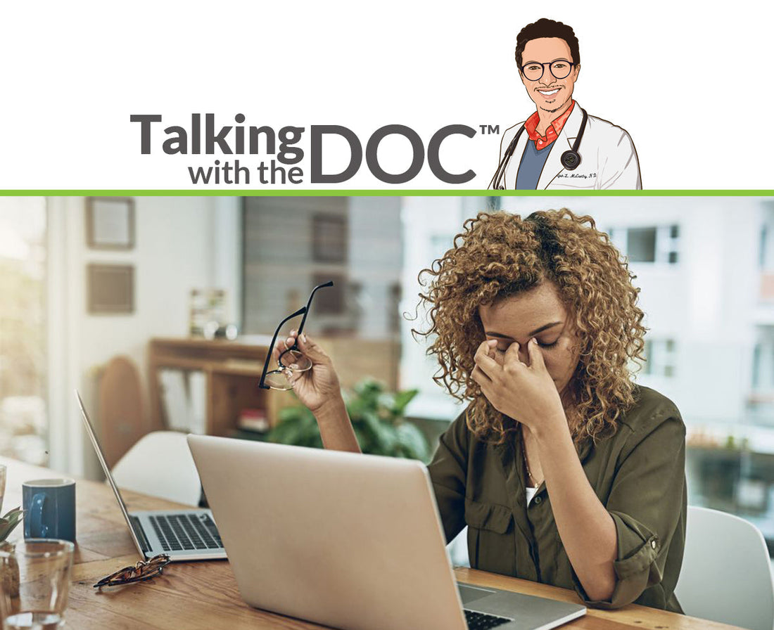 A stressed women sitting at a desk with a laptop under a "Talking with the DOC" logo featuring an illustrated doctor.