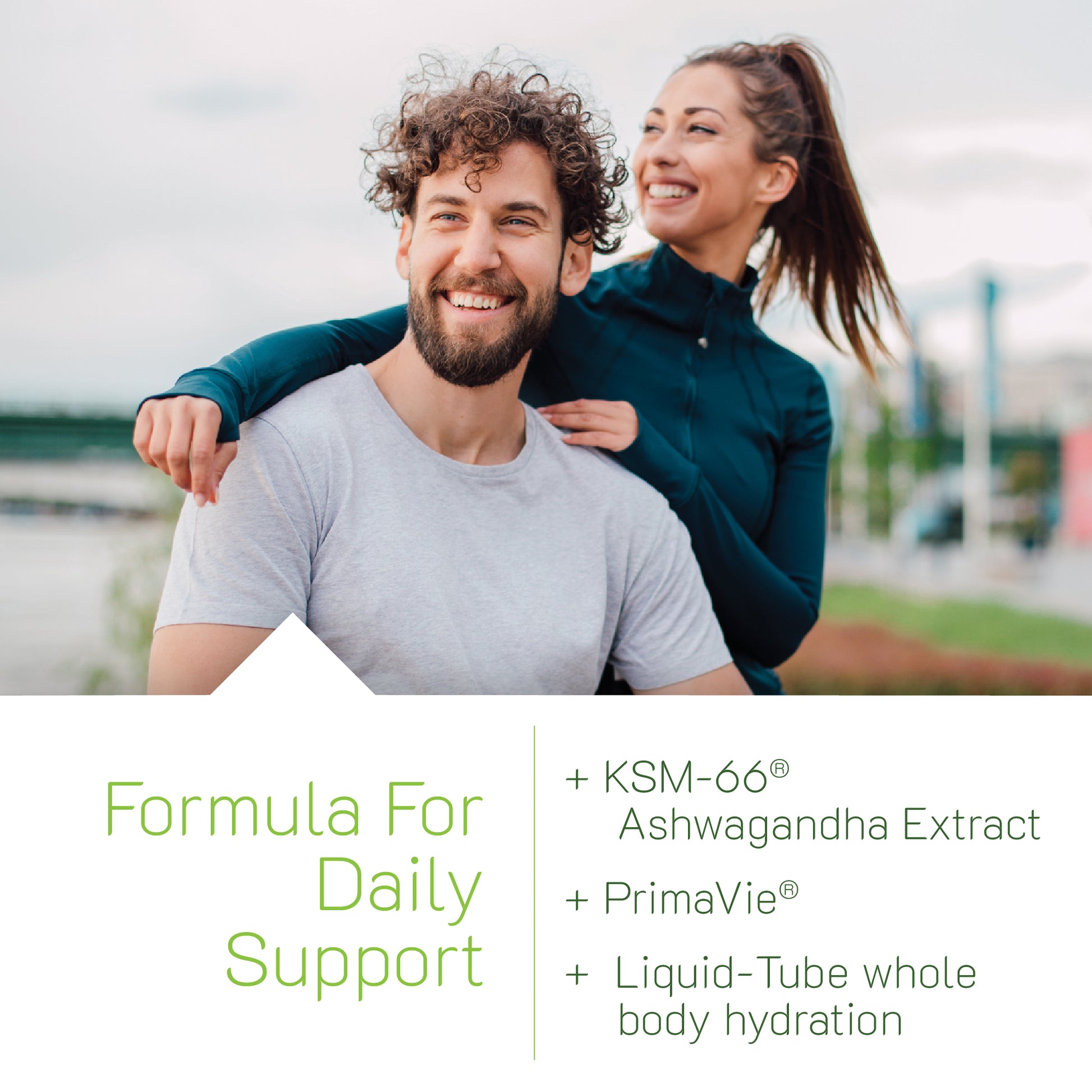 A smiling man and woman outdoors, paired with a 'Formula For Daily Support' text block highlighting Liquid-Tube whole body hydration featuring KSM-66 Ashwagandha Extract and PrimaVie.